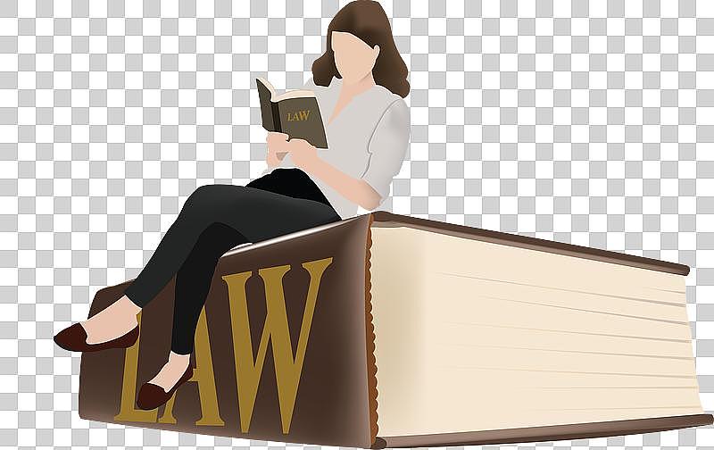 女商人在一座巨大的法律书籍上学习法律图片下载