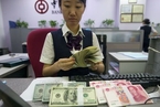 人民币短期走弱 11月银行结售汇重现逆差